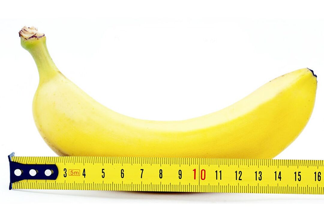 定規の付いたバナナは、手術後の陰茎の測定を象徴しています